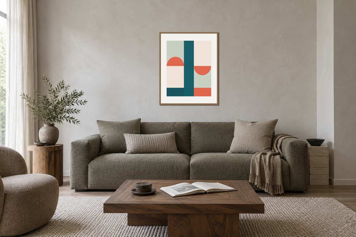 Balanced Noon in an oak frame above an olive-gray sofa in a softly lit living room.