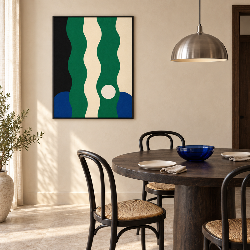 Green-leaning art print styled in a wide, calm interior shot