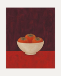 One Bowl Three Persimmons unframed persimmon still life wall art print showing three orange persimmons in a cream bowl on red and maroon