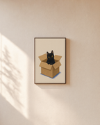 Black Cat in Shipping Box unframed print is shown framed for styling in a plain wall; frame not included