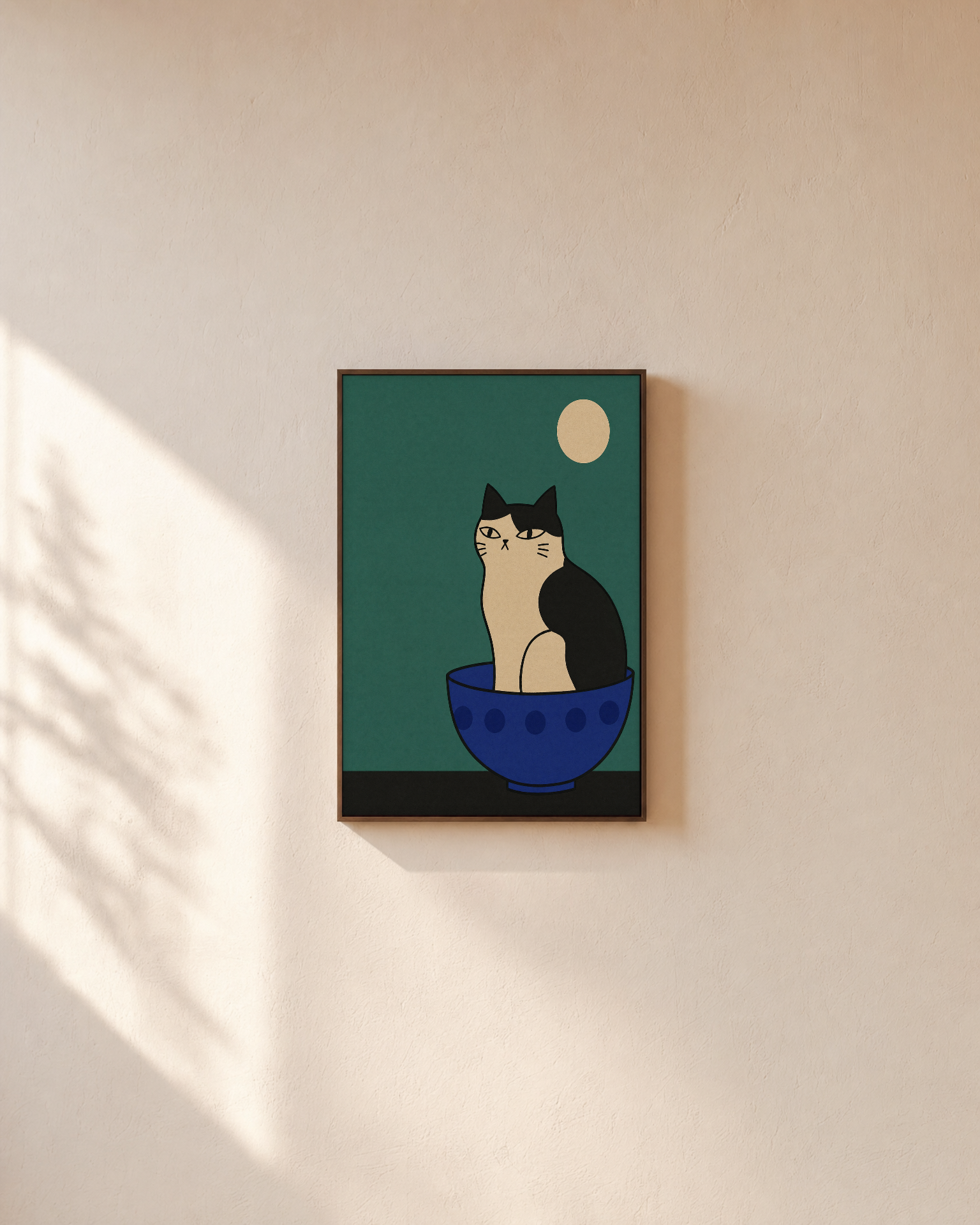 One Cat Cobalt Bowl unframed print is shown framed for styling in a plain wall; frame not included