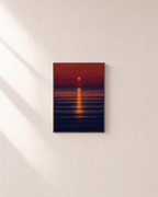 Evening Column sunset wall art: unframed print is shown framed for styling on a plain wall; frame not included