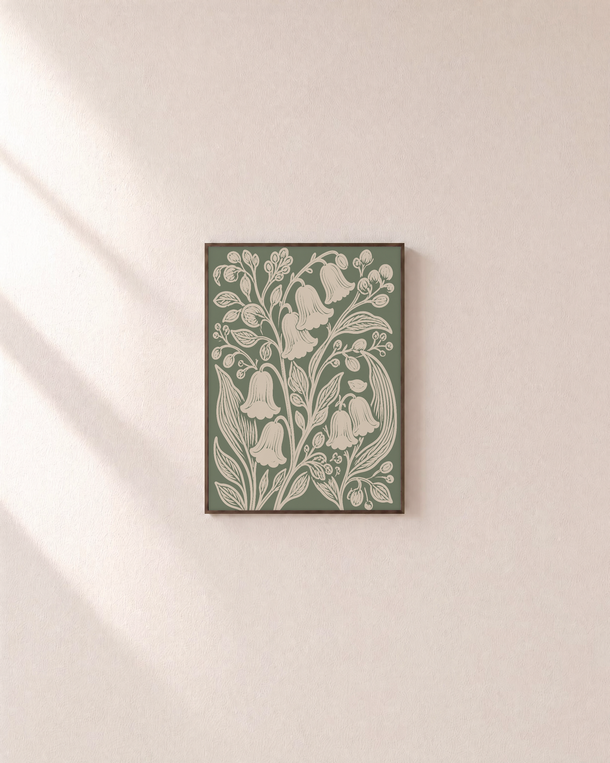 Bell Garden cream bell sage panel wall art: unframed print is shown framed for styling on a plain wall; frame not included