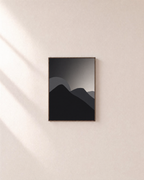 Charcoal Ridges unframed print is shown framed for styling in a plain wall; frame not included