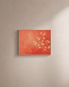 Plum Blossoms From Right unframed print is shown framed for styling in a plain wall; frame not included