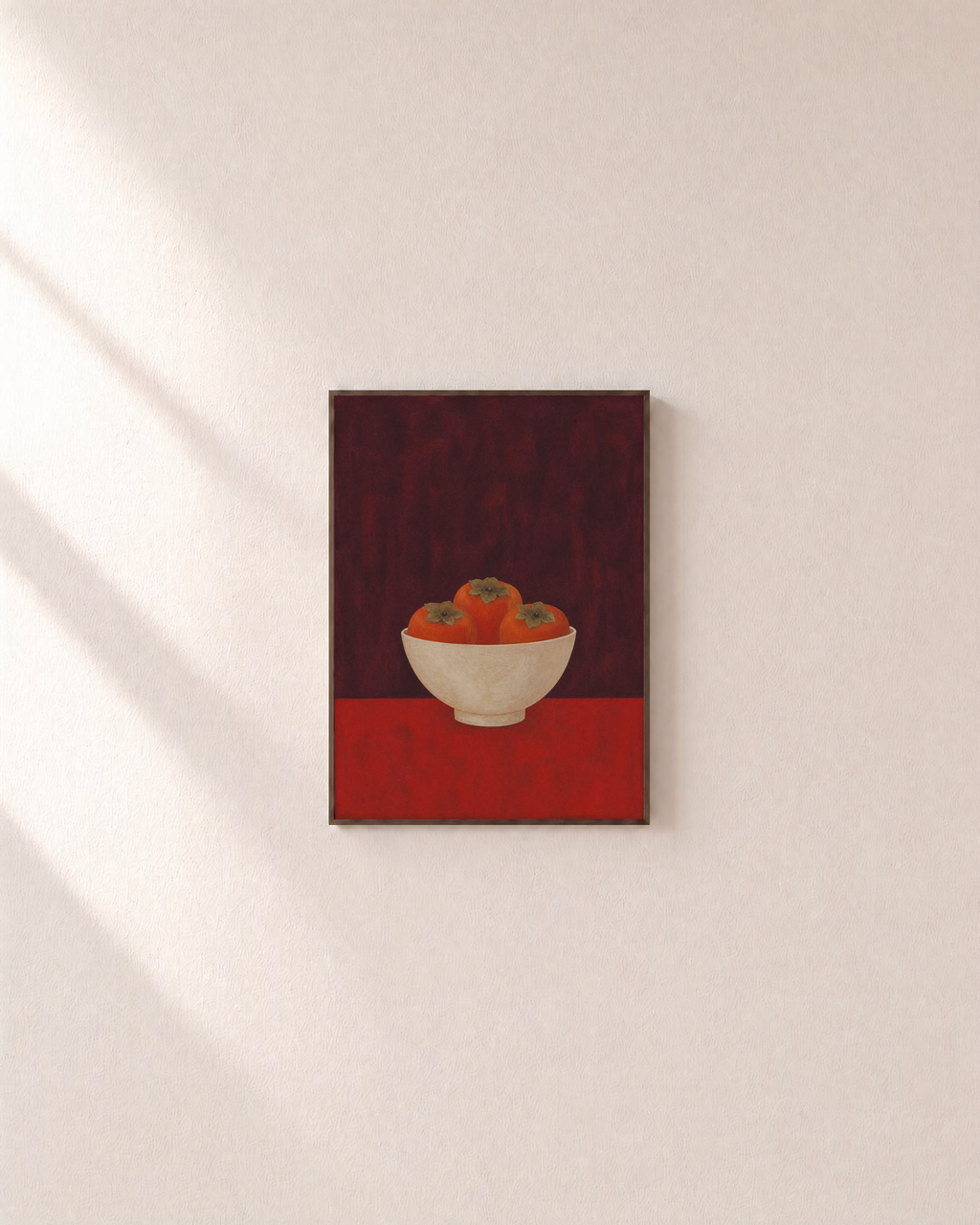One Bowl Three Persimmons unframed print is shown framed for styling in a plain wall; frame not included