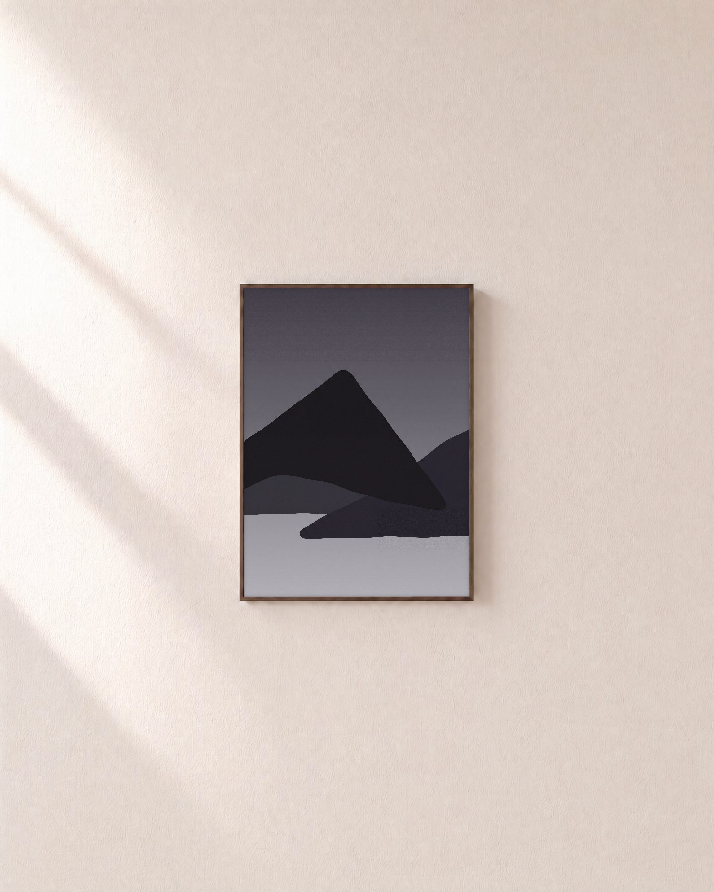 Charcoal Ridges unframed print is shown framed for styling in a plain wall; frame not included