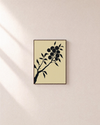 Diagonal Fruiting Branch fruiting branch silhouette wall art print: unframed print is shown framed for styling on a plain wall; frame not included
