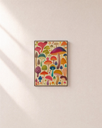 Mushroom Parade botanical mushroom poster print: unframed print is shown framed for styling on a plain wall; frame not included