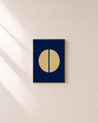 Noon Split Circle unframed print is shown framed for styling in a plain wall; frame not included
