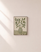Olive Keeper olive branch print: unframed print is shown framed for styling on a plain wall; frame not included