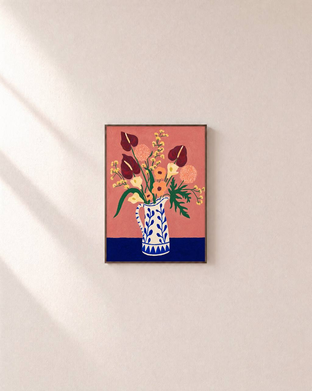 Flower vase print in a slim walnut frame on a plain wall