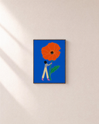 Poppy Bearer poppy prints: unframed print is shown framed for styling on a plain wall; frame not included
