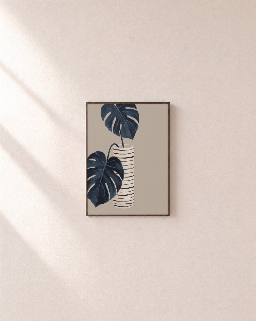 Dark Leaves over Striped Pot striped vase botanical wall art print: unframed print is shown framed for styling on a plain wall; frame not included