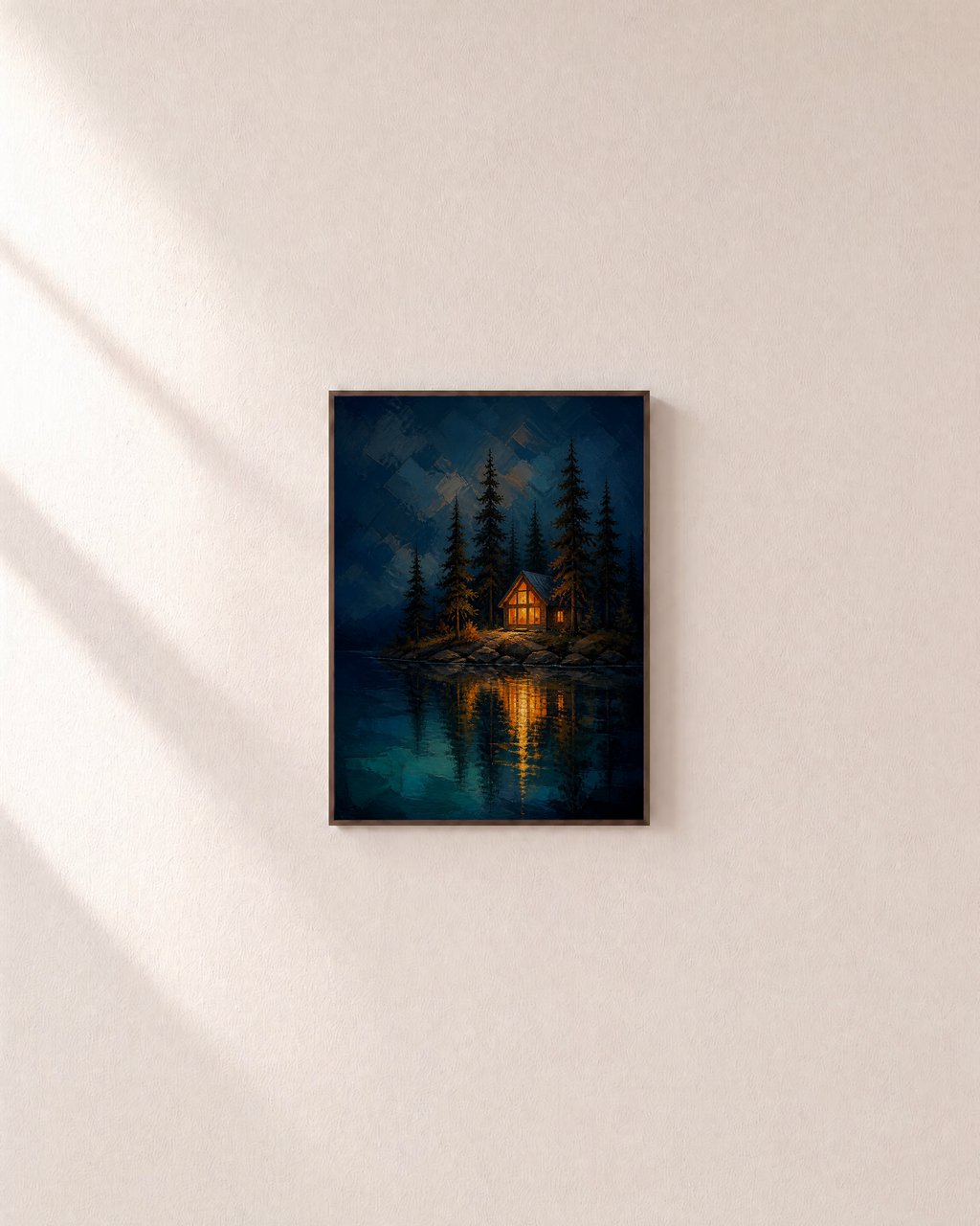 Cabin After Dark night lake cabin print: unframed print is shown framed for styling on a plain wall; frame not included