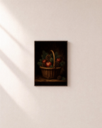 Winter Basket apple basket print: unframed print is shown framed for styling on a plain wall; frame not included