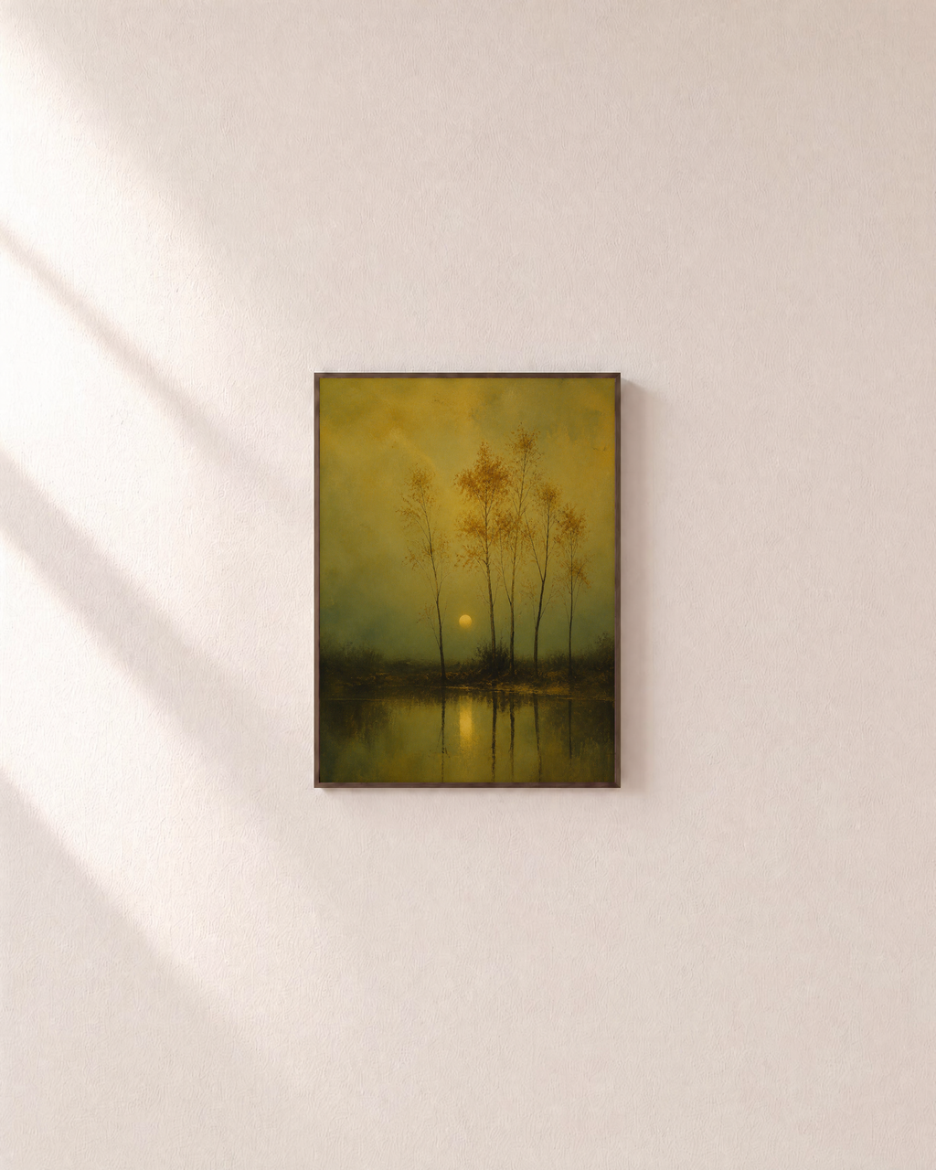Pond Dusk amber pond trees print: unframed print is shown framed for styling on a plain wall; frame not included
