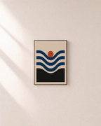 Coral Nest navy wave coral wall art: unframed print is shown framed for styling on a plain wall; frame not included