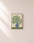 Olive Morning blue vase wall art: unframed print is shown framed for styling on a plain wall; frame not included