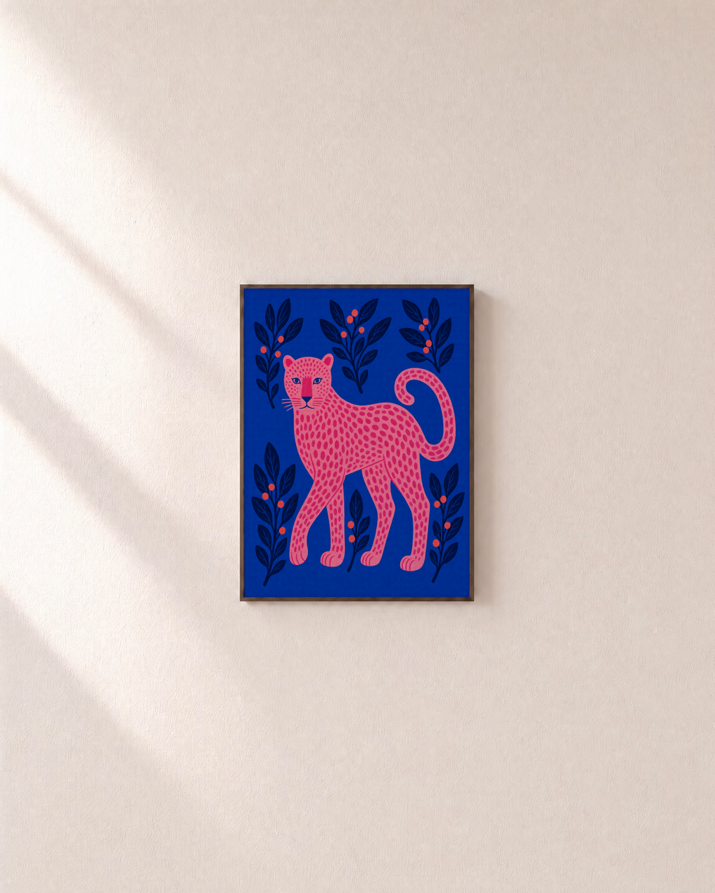 Leopard Patrol leopard wall art: unframed print is shown framed for styling on a plain wall; frame not included