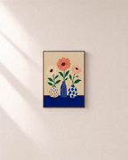 Table Blooms cobalt table flower wall art: unframed print is shown framed for styling on a plain wall; frame not included