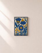 Gold Daisy vintage floral art print: unframed print is shown framed for styling on a plain wall; frame not included