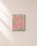 Garden Trio pink daisy wall art: unframed print is shown framed for styling on a plain wall; frame not included