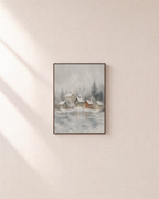Snow Village mist village print: unframed print is shown framed for styling on a plain wall; frame not included