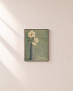 Cream Flowers and Long Leaves cream flowers in grey pitcher wall art print: unframed print is shown framed for styling on a plain wall; frame not included