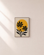 Noon Blooms black bloom silhouette wall art: unframed print is shown framed for styling on a plain wall; frame not included