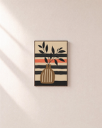 Branch Hour stripe vase wall art: unframed print is shown framed for styling on a plain wall; frame not included