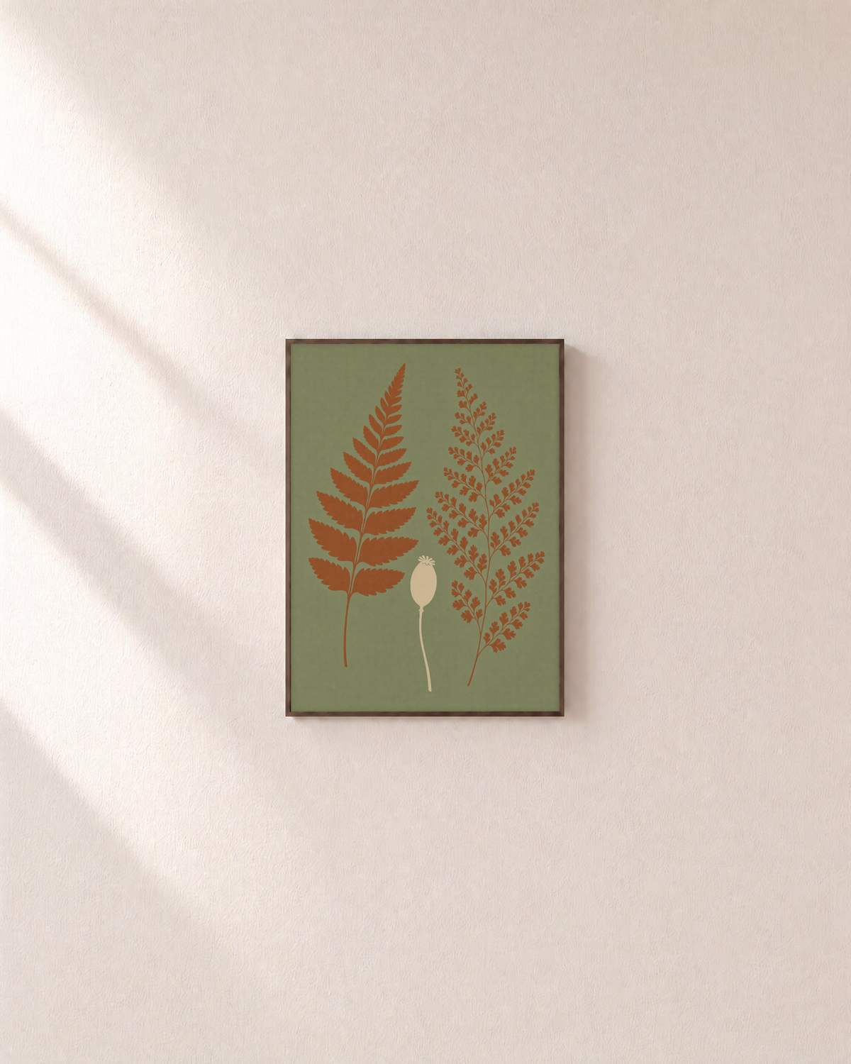 Fern Pair fern art prints: unframed print is shown framed for styling on a plain wall; frame not included