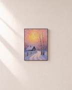 Cottage Sundown sunset cottage print: unframed print is shown framed for styling on a plain wall; frame not included