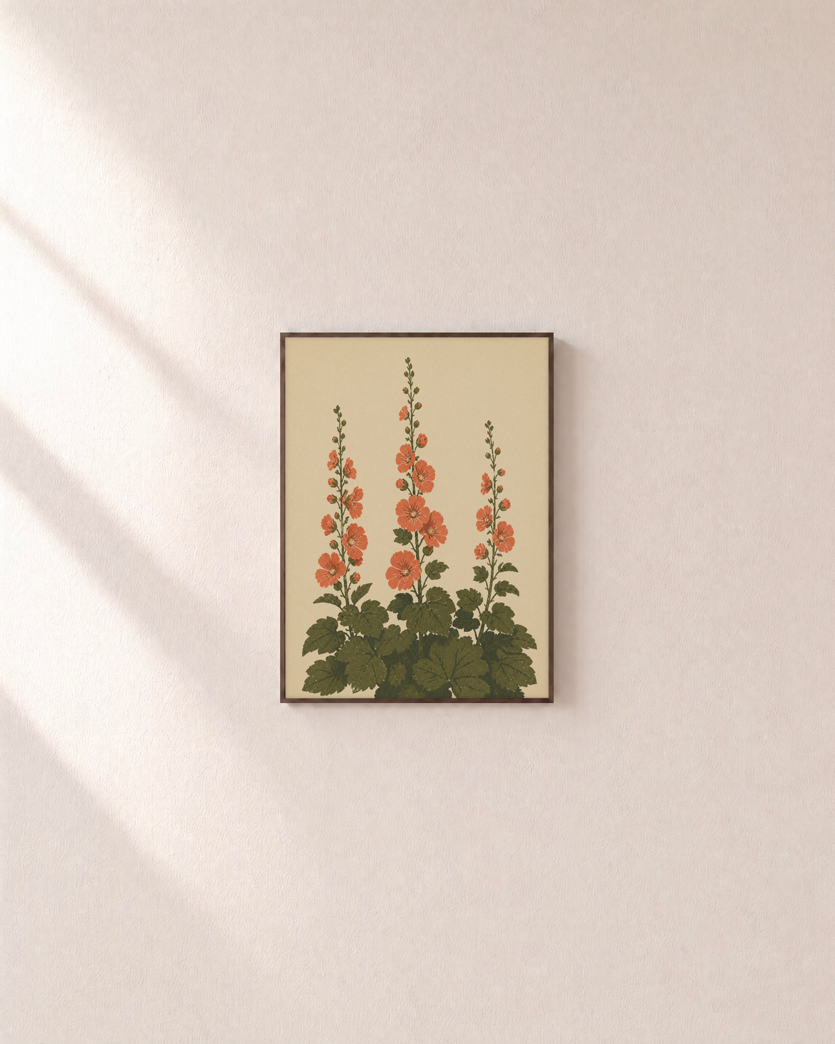 Hollyhock Towers hollyhock wall art: unframed print is shown framed for styling on a plain wall; frame not included