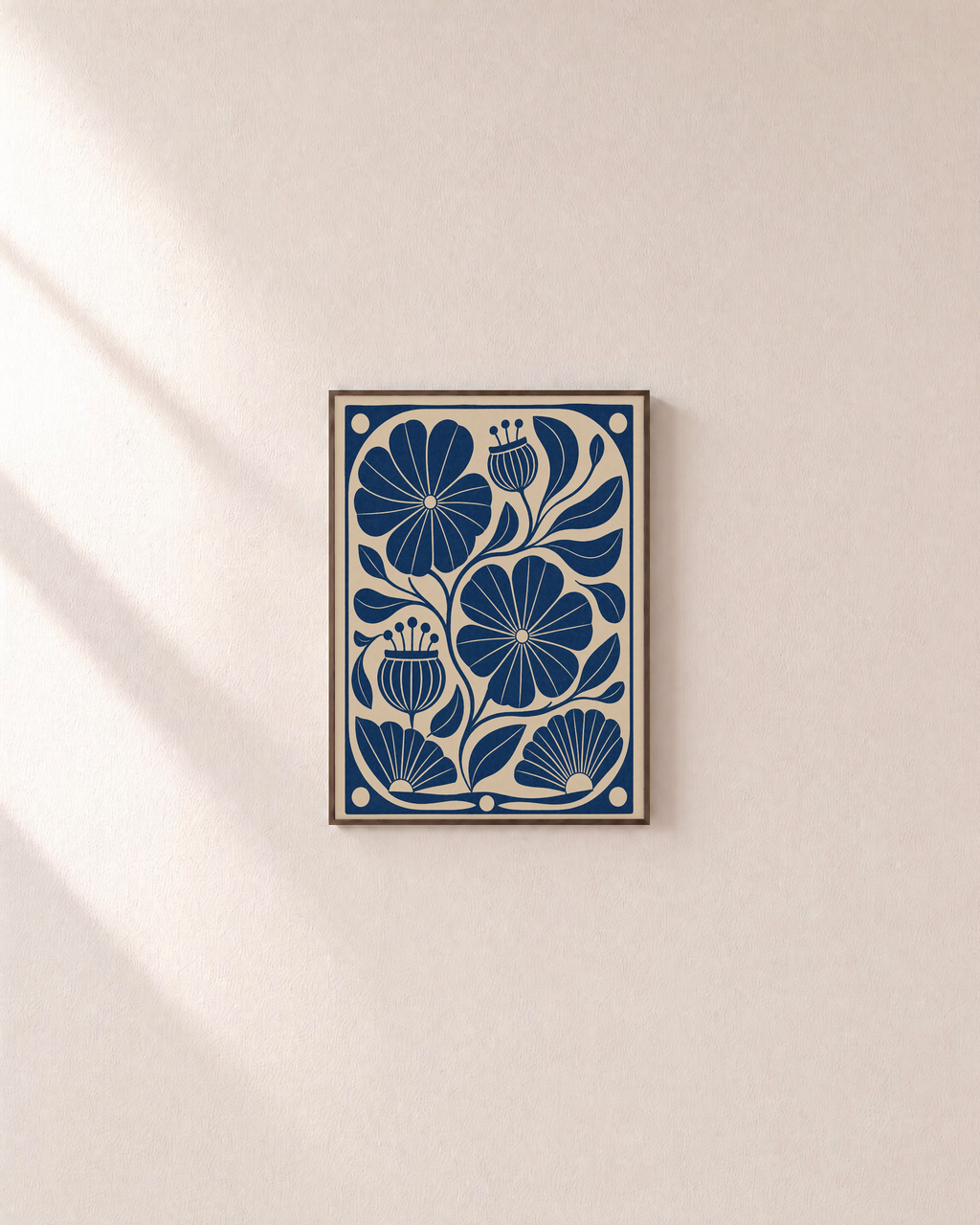Pod Garden blue flower wall art: unframed print is shown framed for styling on a plain wall; frame not included
