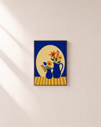 Cobalt Bowl Mixed Bloom Remap unframed print is shown framed for styling in a plain wall; frame not included