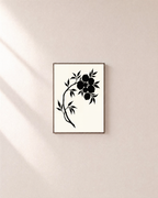 Ink Branch Fruit unframed print is shown framed for styling in a plain wall; frame not included