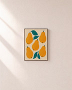 Five Pears yellow pear wall art: unframed print is shown framed for styling on a plain wall; frame not included