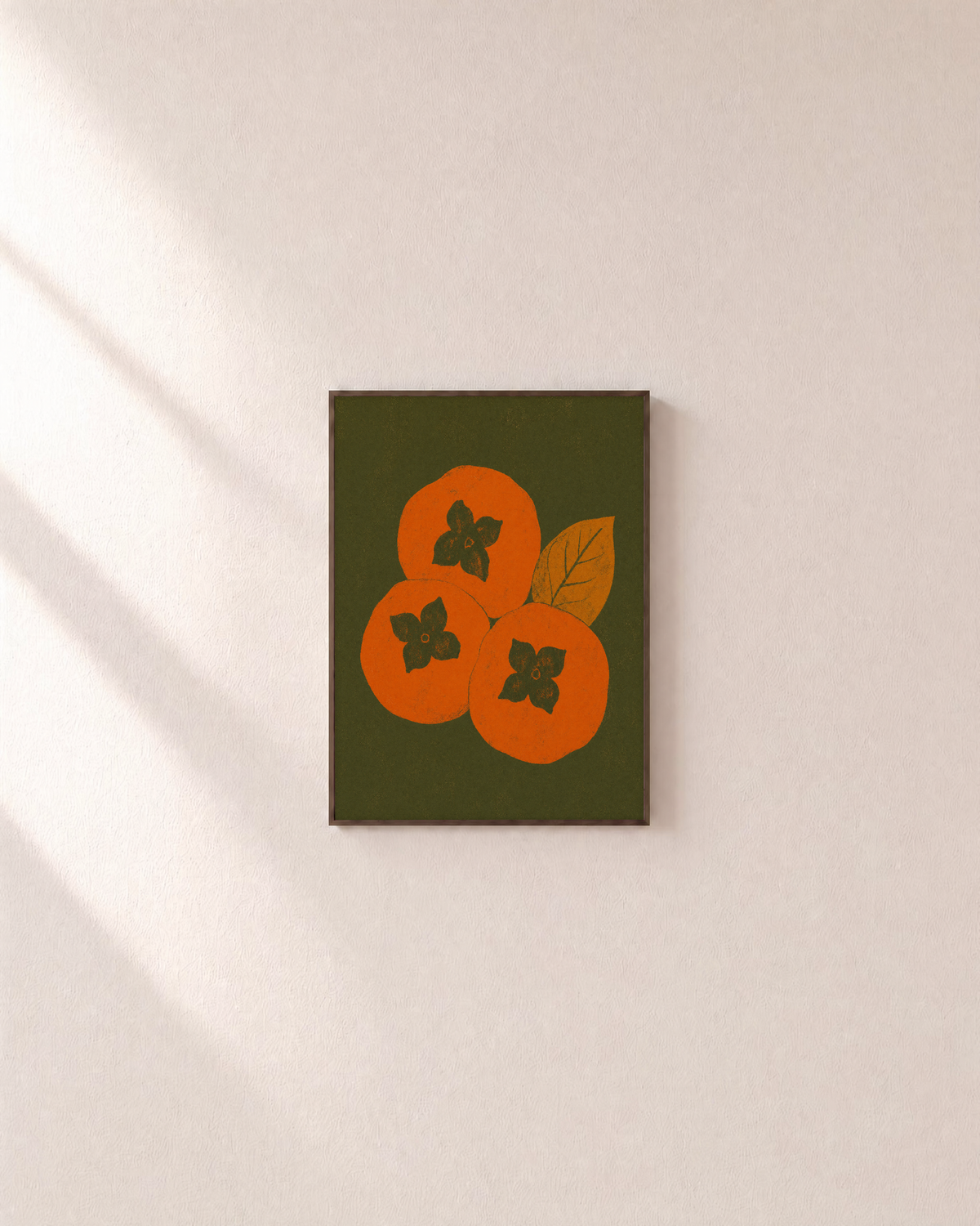 Olive Calyx olive persimmon wall art: unframed print is shown framed for styling on a plain wall; frame not included