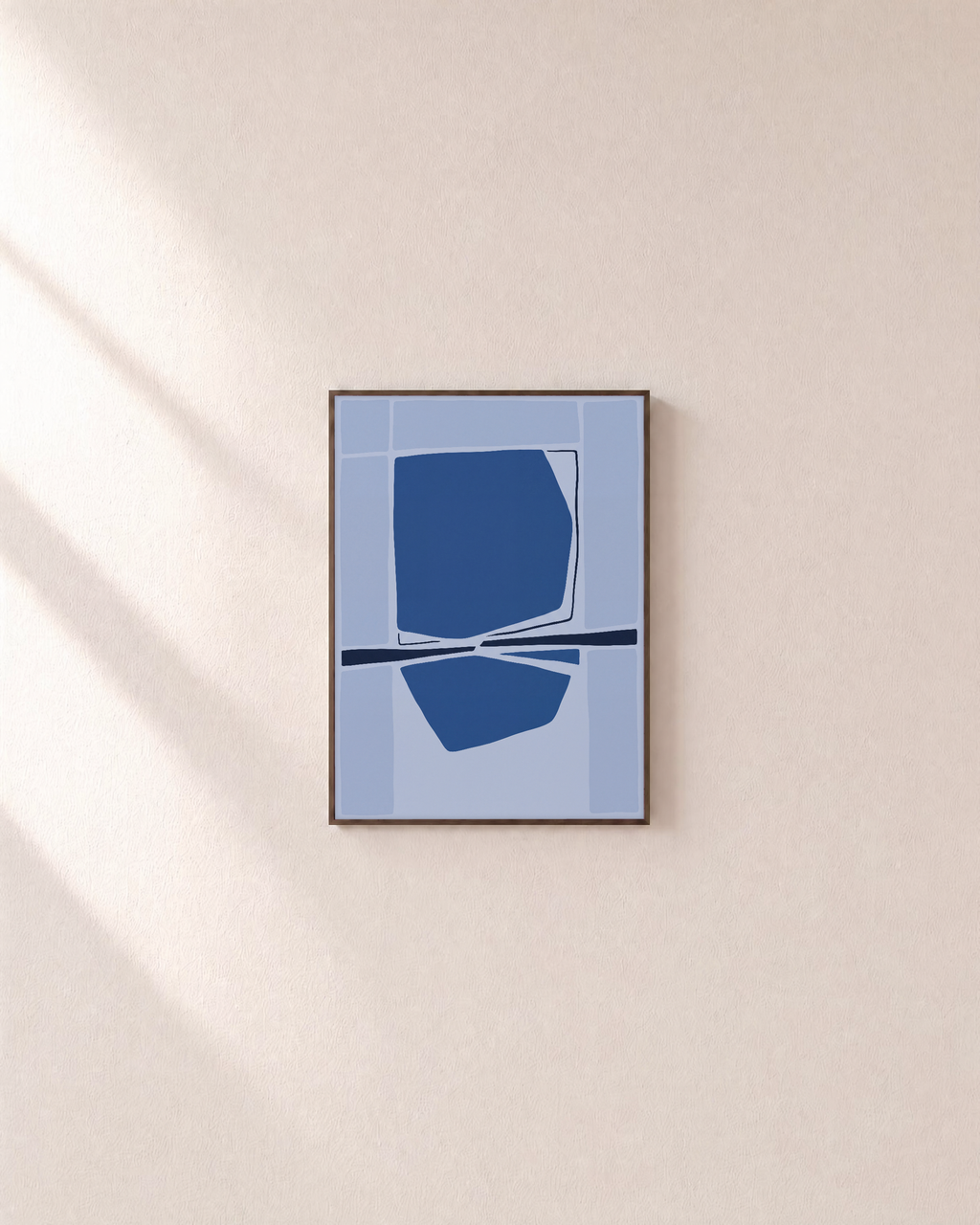 Twin Tide navy blue geometric wall art: unframed print is shown framed for styling on a plain wall; frame not included