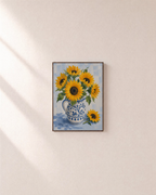 Pitcher Morning botanical sunflower print: unframed print is shown framed for styling on a plain wall; frame not included