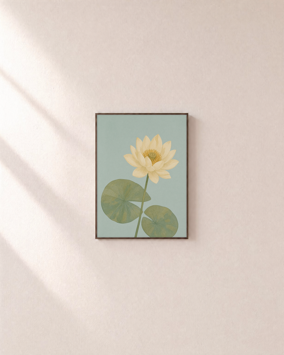 Lotus Pause single lotus wall art: unframed print is shown framed for styling on a plain wall; frame not included