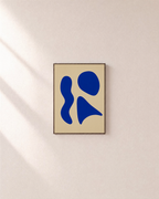 One Rest cobalt shape wall art: unframed print is shown framed for styling on a plain wall; frame not included