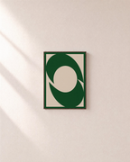 Two Green Arcs One Disk unframed print is shown framed for styling in a plain wall; frame not included
