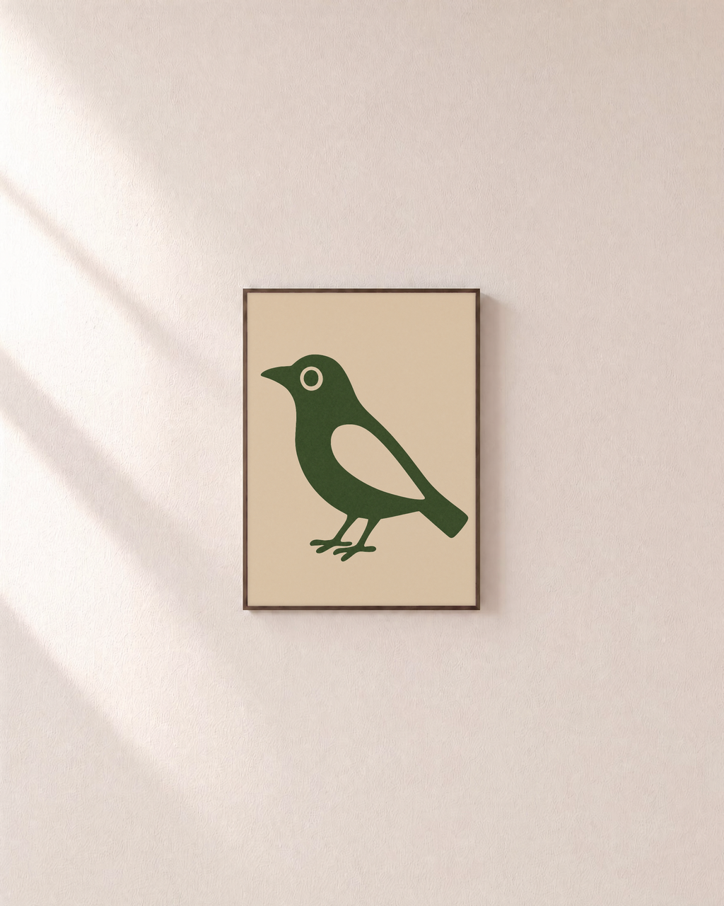 Still Bird green bird print: unframed print is shown framed for styling on a plain wall; frame not included
