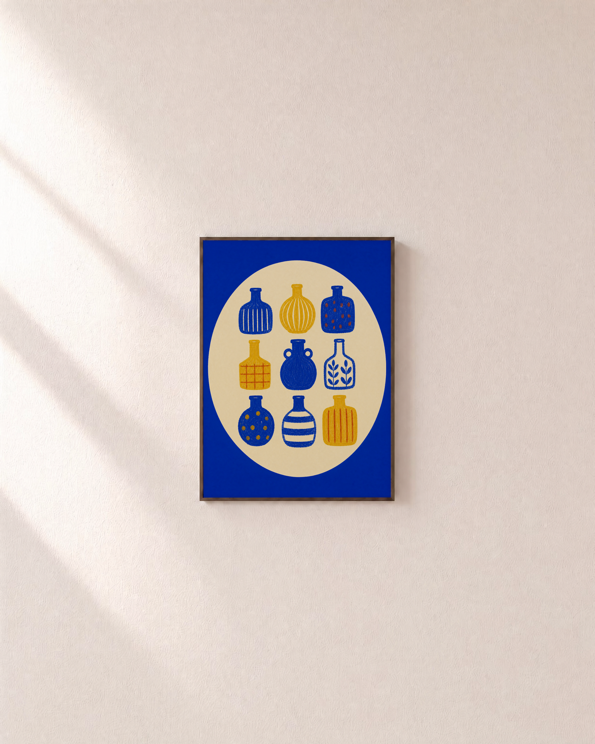 Bottle Hour cobalt bottle wall art: unframed print is shown framed for styling on a plain wall; frame not included