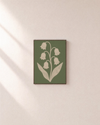 Bell Vine cream bell vine wall art: unframed print is shown framed for styling on a plain wall; frame not included
