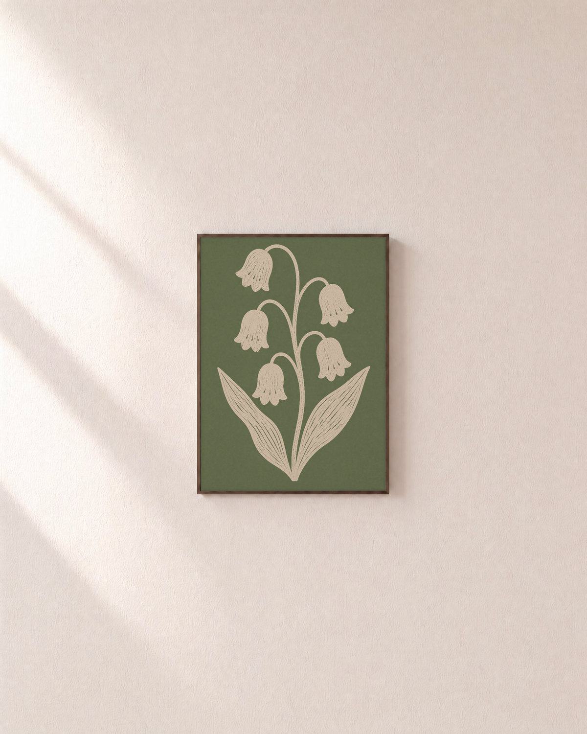 Bell Vine cream bell vine wall art: unframed print is shown framed for styling on a plain wall; frame not included