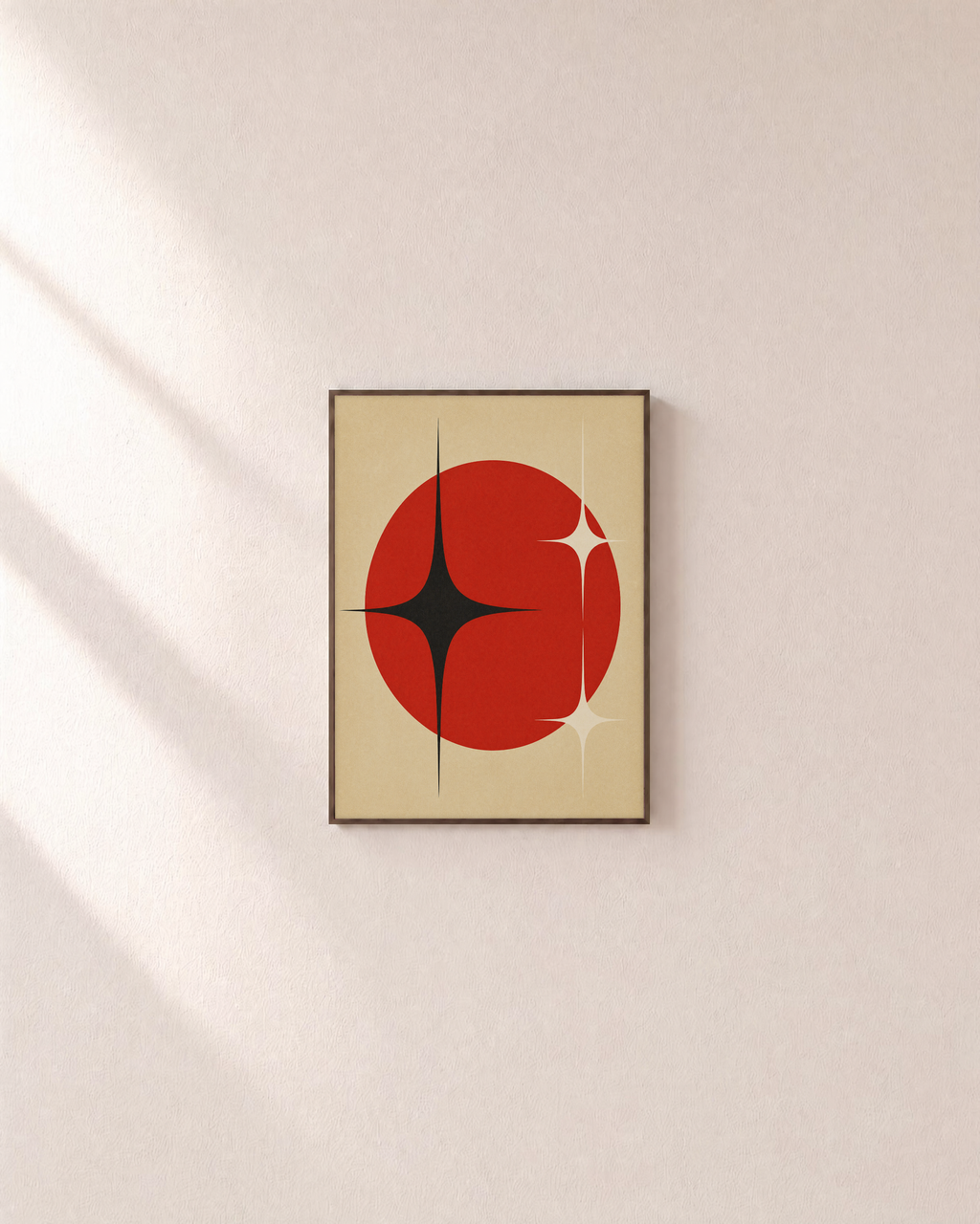 Atomic Signal red atomic spark wall art: unframed print is shown framed for styling on a plain wall; frame not included