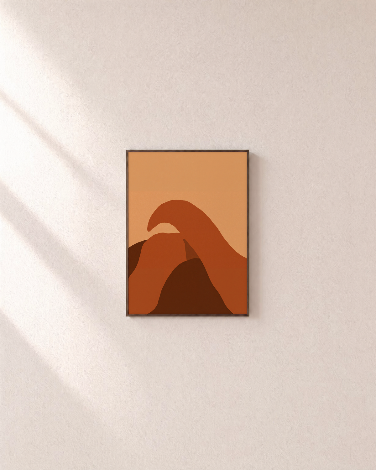 Terracotta Arc on Peach burnt orange abstract wall art: unframed print is shown framed for styling on a plain wall; frame not included